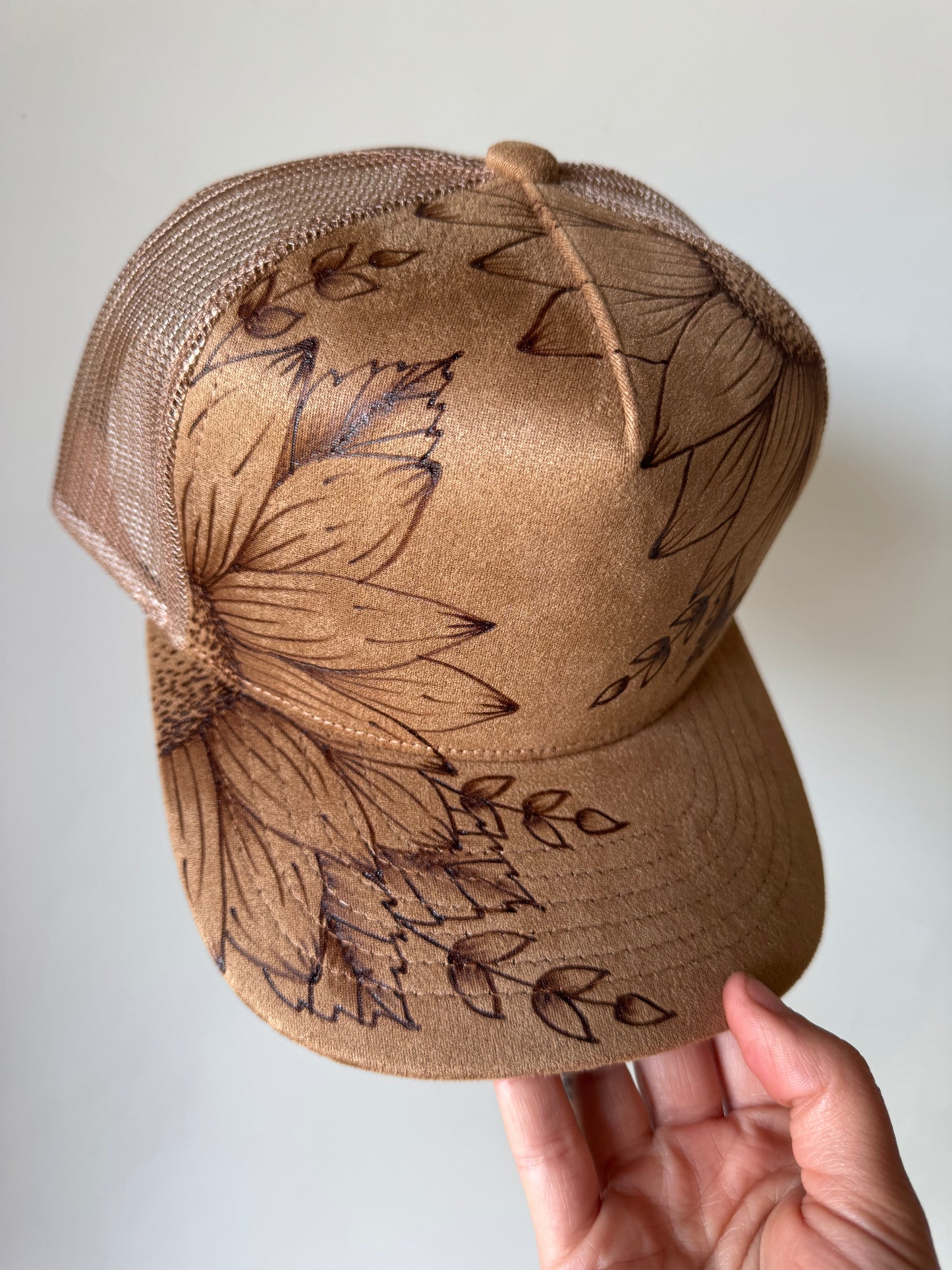 Sun-kissed Petals Burned Trucker Hat